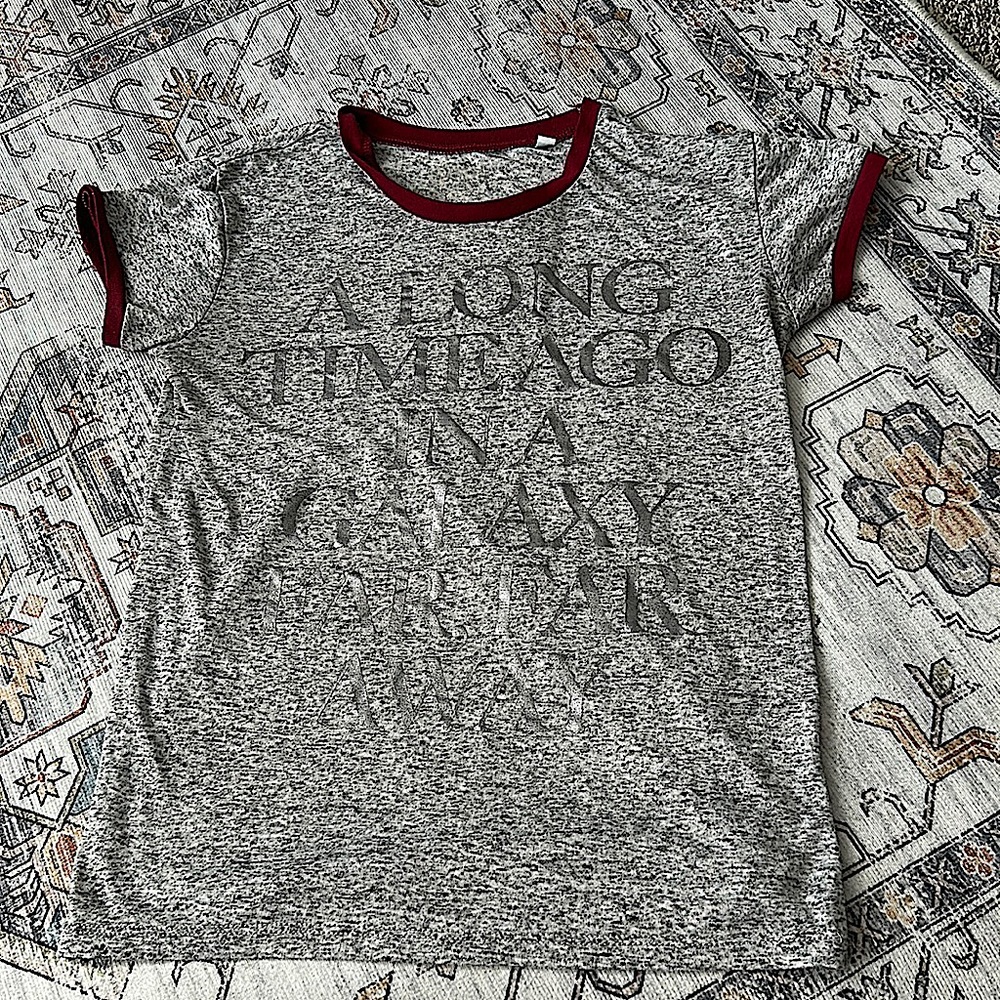 Star Wars Foil Ringer T-Shirt “Long Ago In A
Galaxy Far Fat Away”, size Small